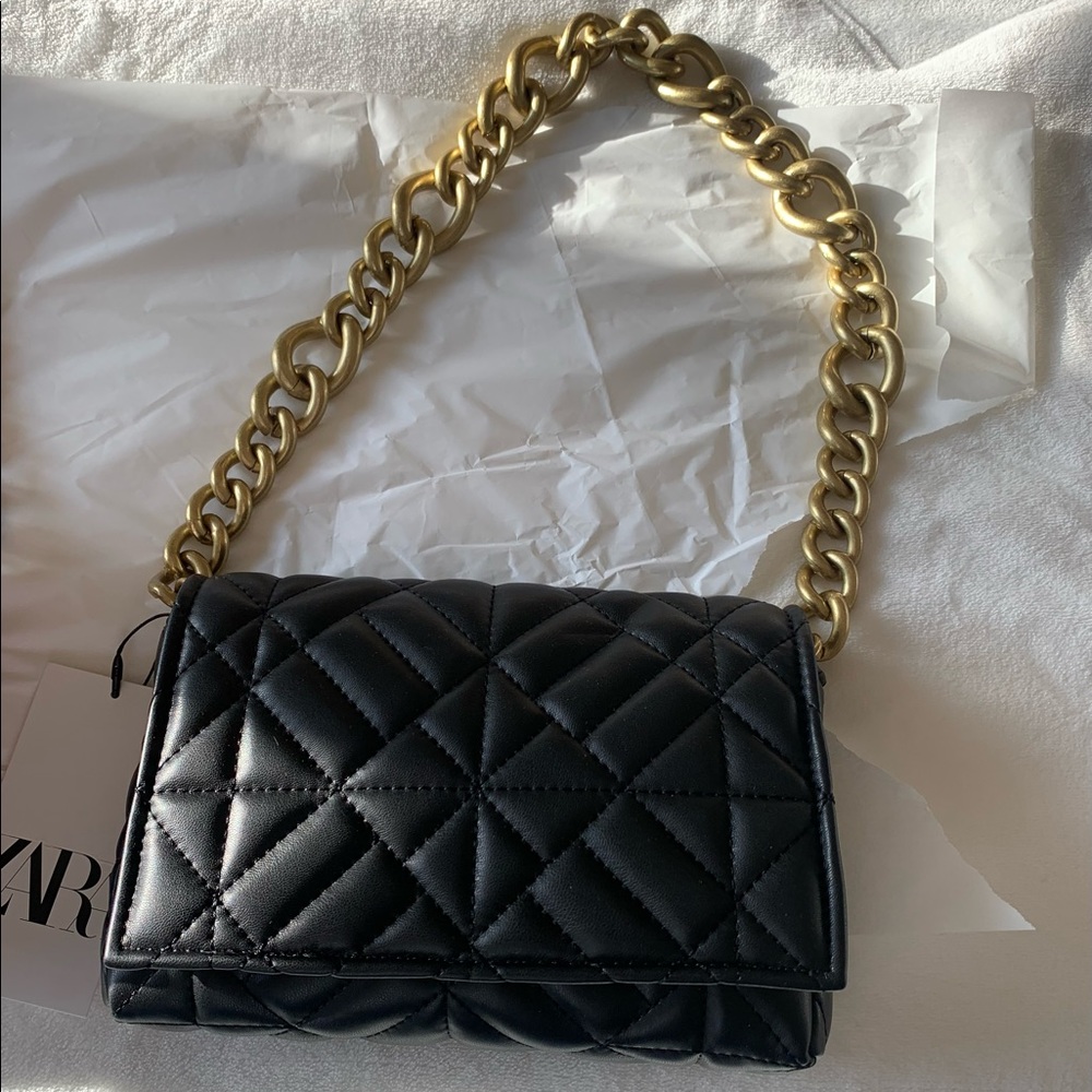 Black Zara bag with gold hardware.